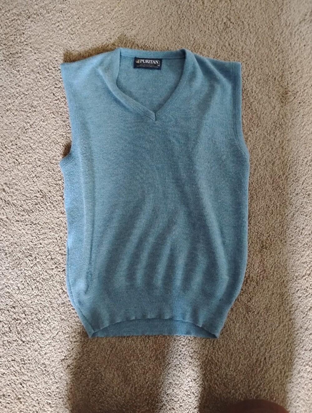 Light blue sweater vest
